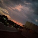 Nigerian student deciding on course change on laptop