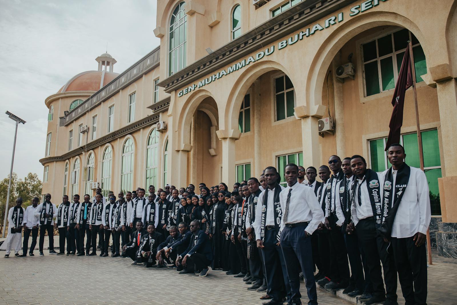Students celebrating university admission acceptance fee payment